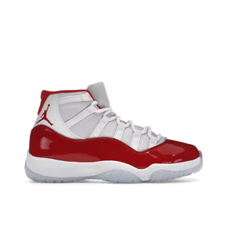 Jordan 11 Retro Cherry. Red and white sneaker on a white background