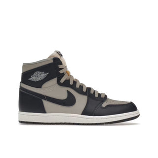 Jordan 1 Retro High '85 Georgetown. Black and gray high-top sneaker with Nike logo on a white background