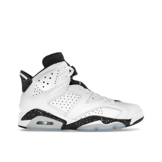 Jordan 6 Retro Reverse Oreo. White sneaker with black accents on a white background